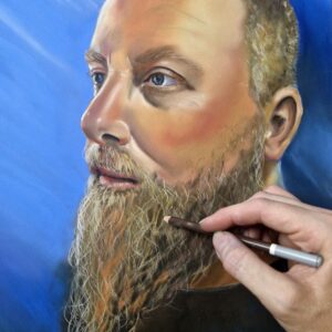 A vibrant pastel artwork portrait of a bearded man by the artist Stacey Bennett